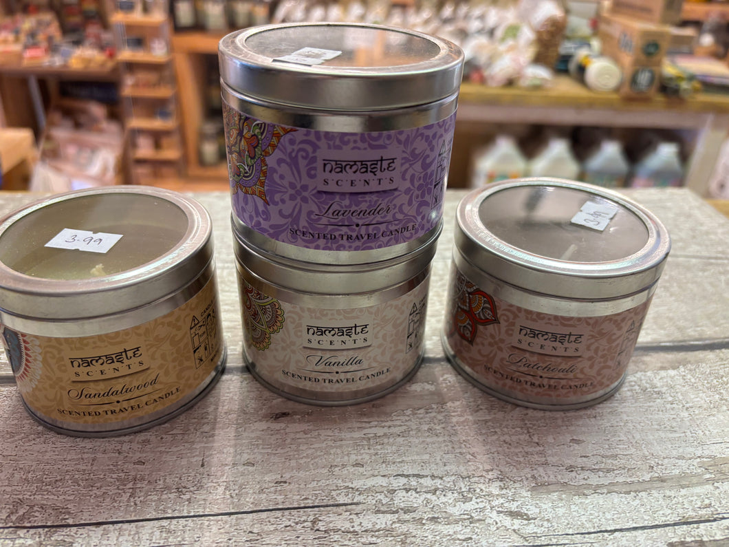 Namaste secrets scented candle in Tin with glass lid