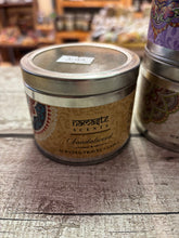 Load image into Gallery viewer, Namaste secrets scented candle in Tin with glass lid

